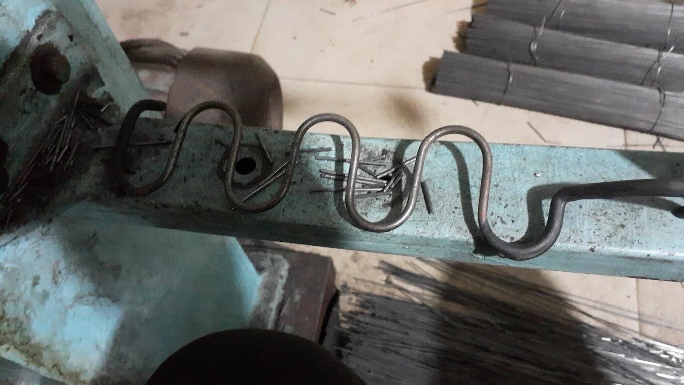 Wire form bending in progress